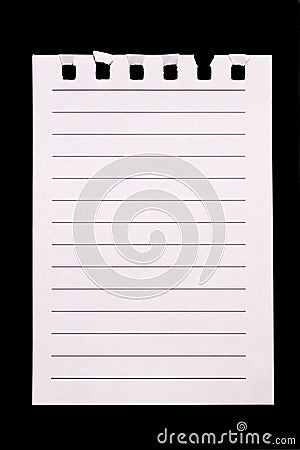 A torn page from a notebook on a black vertical background Stock Photo