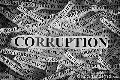 Torn pieces of paper with the word Corruption Stock Photo