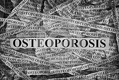 Torn pieces of paper with word Osteoporosis Stock Photo