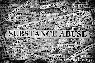 Torn pieces of paper with the words Substance Abuse Stock Photo