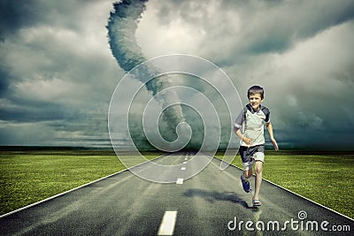 Tornado and running boy Stock Photo