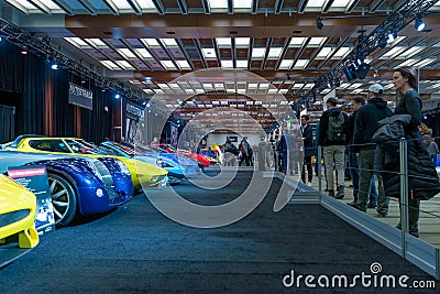 Visitors view the presented cars at the 2020 Canadian International Auto Show Editorial Stock Photo
