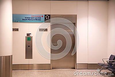 TORONTO, CANADA - JAN 21st, 2017: airport interior, Air Canada Maple Leaf Lounge at YYZ airport elevator Editorial Stock Photo