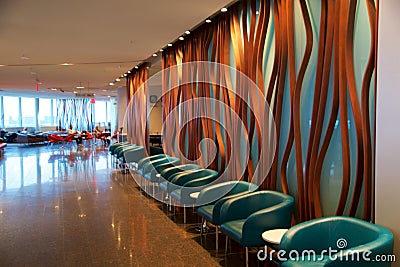 TORONTO, CANADA - JAN 21st, 2017: airport interior, Air Canada Maple Leaf Lounge at YYZ airport with leather chairs, bar Editorial Stock Photo