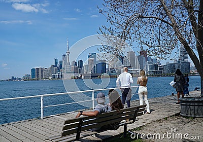 waterfront boardwalk, with the downtown skyline in the background Editorial Stock Photo