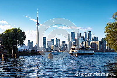 Toronto, Ontario, Canada, View of Skyline and Ferry Boat Arriving at Centre Island Editorial Stock Photo