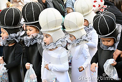 TORREVIEJA, SPAIN FEBRUARY 12, 2023: Kids in a colorful carnival costumes at a festive parade, Alicante, Costa blanca region. Editorial Stock Photo