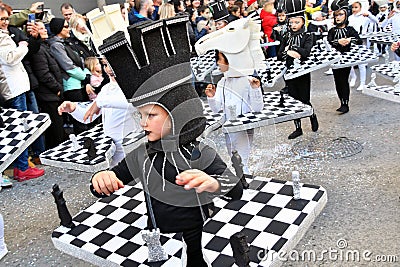 TORREVIEJA, SPAIN FEBRUARY 12, 2023: Kids in a colorful carnival costumes at a festive parade, Alicante, Costa blanca region. Editorial Stock Photo