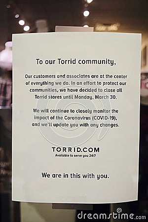 Torrid Store COVID-19 Sign Editorial Stock Photo