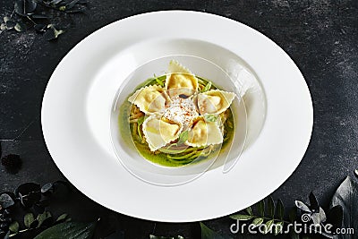 Tortellini with Shrimps and Young Zucchini Ragout Stock Photo