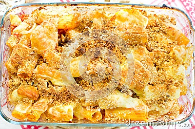 tortiglioni ( twisted spiral maccheroni) baked pasta mozzarella Stock Photo