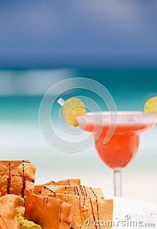 Tortilla chips and strawberry margarita cocktail Stock Photo
