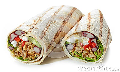 Tortilla wrap with fried minced meat and vegetables Stock Photo