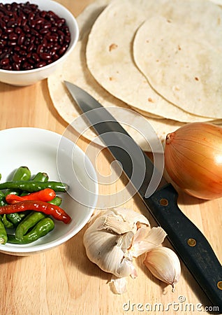 Tortillas chillis beans onion Stock Photo