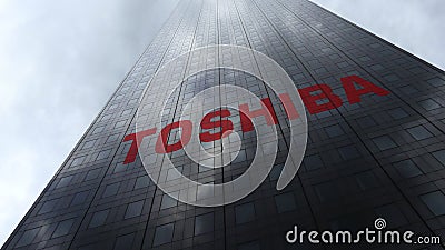 Toshiba Corporation logo on a skyscraper facade reflecting clouds. Editorial 3D rendering Editorial Stock Photo