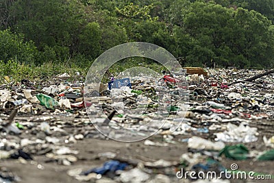 Total pollution on a Tropical pacific beach, Panama Stock Photo