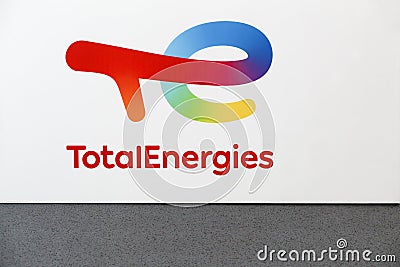 TotalEnergies logo on a wall Editorial Stock Photo