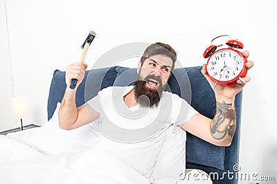 It is totally normal to hate your alarm sound. Hateful schedule. Best alarm clocks for people who hate mornings. Man Stock Photo