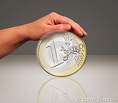 Touch the coin Stock Photo
