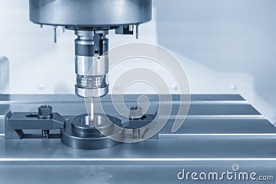 The touch probe attach on the CNC milling machine for calibration process with ring gage. Stock Photo