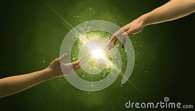 Touching arms lighting spark at fingertip Stock Photo