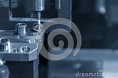 The touching probe attach on CNC machine calibration process. Stock Photo
