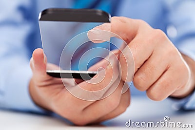 Touchscreen gadget in businessman hands Stock Photo