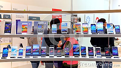 Touchscreen smartphones at store Editorial Stock Photo