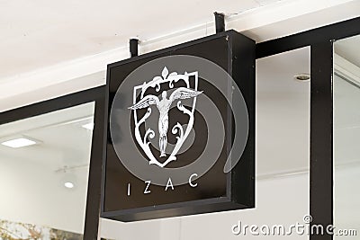 Izac sign text store and logo brand shop on facade boutique Editorial Stock Photo
