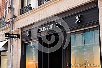 Louis Vuitton logo text sign store street luxury brand fashion shop Editorial Stock Photo