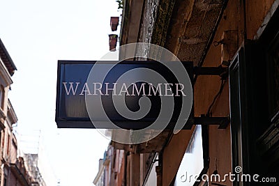 Warhammer text sign store and logo brand shop specialist retail toys fantasy board Editorial Stock Photo