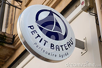 Petit Bateau child fashion store text and logo sign means Small boat boutique kids Editorial Stock Photo