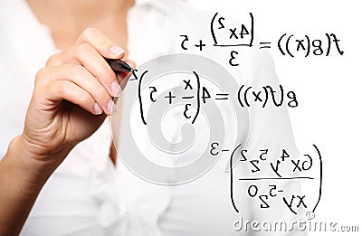 Toung teacher solving a mathematical equation Stock Photo