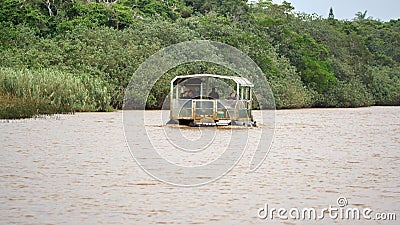 Tour boat in the estuary Editorial Stock Photo