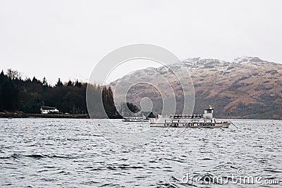 Tour boat on Loch Lomond near Tarbet, Scotland, in spring. Editorial Stock Photo