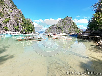 Tour boats parked at Lake Kayangan Editorial Stock Photo