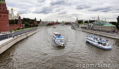 Tour boats / ships are on Moskva river. Stock Photo