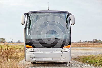 Tour bus staying outdoors Stock Photo