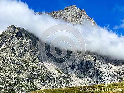Tour de Mont Blanc hike with view along Dora di Ferret near Tete de Ferret Stock Photo