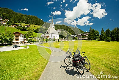 Touring bicycles in a village in Austria Stock Photo