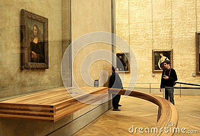 Tourist Admiring the Mona Lisa in The Louvre Editorial Stock Photo