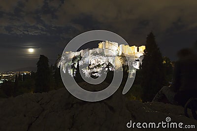 Tourist admiring the Parthenon on Acropolis Stock Photo