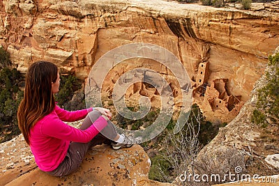 Tourist admiring Square Tower House, Mesa Verde National Park, C Stock Photo