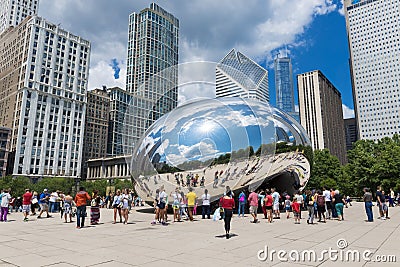 Tourist around the Cloud Gate `The Beam` at the Millennium Park in Chicago, Illinois Editorial Stock Photo