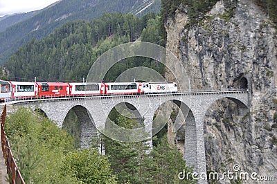 Tourist attraction: Crossing the swiss alps in the Glacier Express train. DIe Touristenattraktion: Alpentransversale im Glacier E Stock Photo