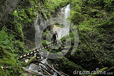 A tourist in the beautiful gorges of the Slovak Paradise National Park Editorial Stock Photo