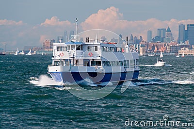 Tourist boat heading to Liberty Island Stock Photo