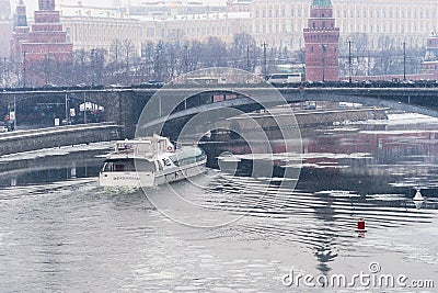 Tourist boat, Moscow Kremlin, snow Editorial Stock Photo