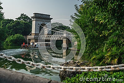 Tourist boat sailing under the bridge in Guilin Editorial Stock Photo