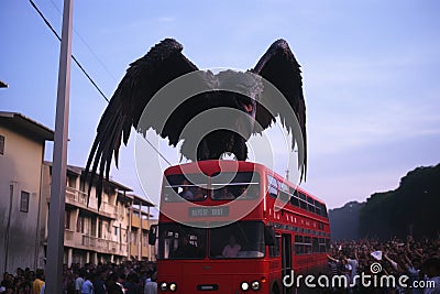 Tourist bus on the street of Barcelona, Flamengo fans following their bus. Huge vulture, AI Generated Stock Photo